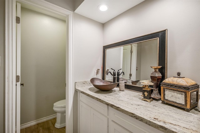 36602 Hondo Rd, Simonton, TX 77485 - bathroom featuring vanity and wood finished floors
