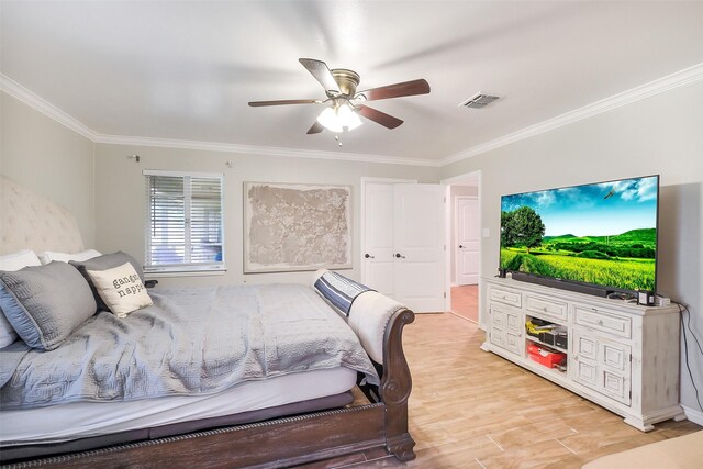 36602 Hondo Rd, Simonton, TX 77485 - bedroom with crown molding, light wood-type flooring, and ceiling fan