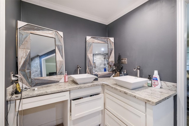 36602 Hondo Rd, Simonton, TX 77485 - bathroom featuring double vanity, a tile shower, and ornamental molding