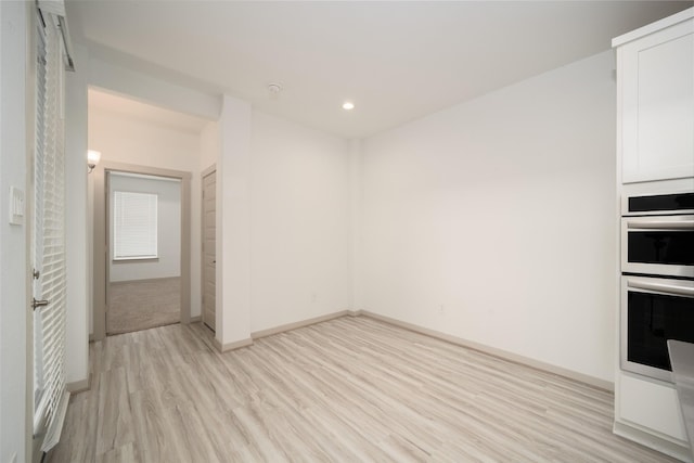 29423 Red Rocks Park Dr, Katy, TX 77494 - unfurnished room featuring light wood-style flooring and recessed lighting
