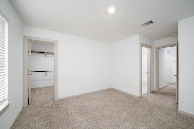 29423 Red Rocks Park Dr, Katy, TX 77494 - unfurnished bedroom featuring carpet floors and a spacious closet