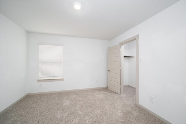 29423 Red Rocks Park Dr, Katy, TX 77494 - unfurnished bedroom with carpet floors, a walk in closet, and a closet