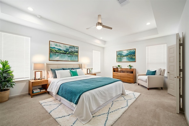 29423 Red Rocks Park Dr, Katy, TX 77494 - bedroom featuring light colored carpet, recessed lighting, a raised ceiling, and a ceiling fan