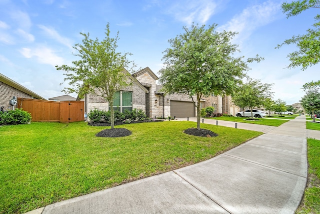 32927 Franklin Brooks Dr, Brookshire, TX 77423 - obstructed view of property featuring stone siding, an attached garage, concrete driveway, and brick siding