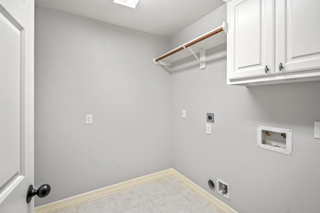16115 Woodbend Trail Dr, Houston, TX 77070 - laundry room with hookup for an electric dryer, cabinet space, washer hookup, and tile patterned floors