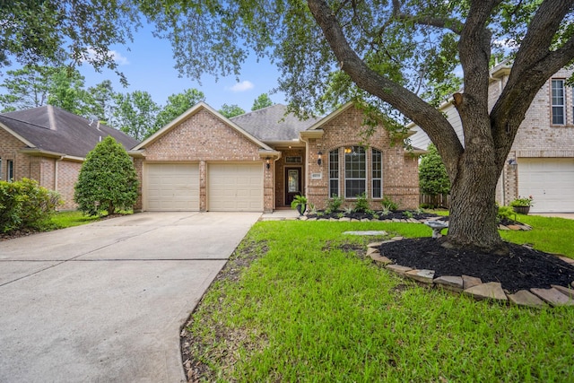 16115 Woodbend Trail Dr, Houston, TX 77070 - view of front of property featuring brick siding, an attached garage, a front yard, driveway, and roof with shingles