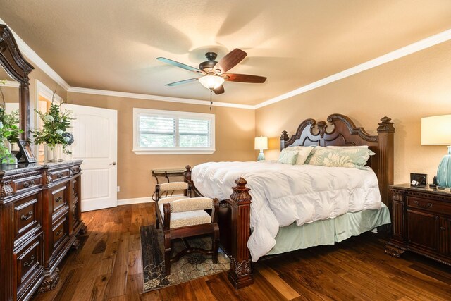 116 Cardinal St, Lake Jackson, TX 77566 - bedroom featuring dark wood finished floors, ornamental molding, and ceiling fan