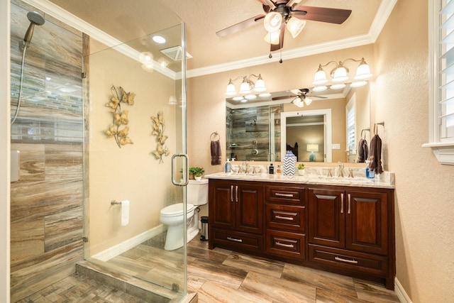 116 Cardinal St, Lake Jackson, TX 77566 - bathroom featuring ceiling fan, ornamental molding, a stall shower, double vanity, and a textured wall
