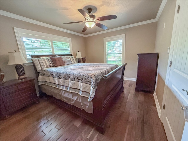 116 Cardinal St, Lake Jackson, TX 77566 - bedroom with multiple windows, dark wood finished floors, crown molding, and a ceiling fan