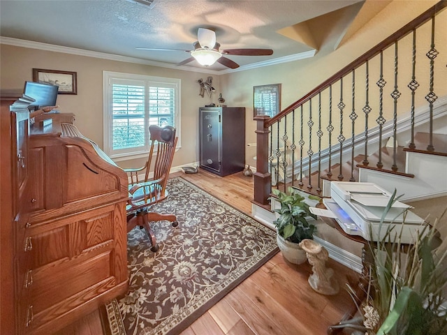 116 Cardinal St, Lake Jackson, TX 77566 - home office featuring a ceiling fan, crown molding, and wood finished floors