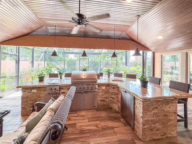 116 Cardinal St, Lake Jackson, TX 77566 - view of patio / terrace with an outdoor kitchen and a lanai