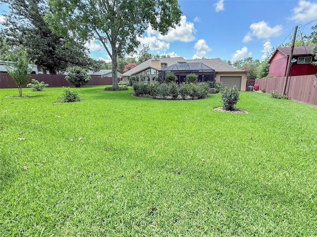 116 Cardinal St, Lake Jackson, TX 77566 - view of yard featuring an attached garage