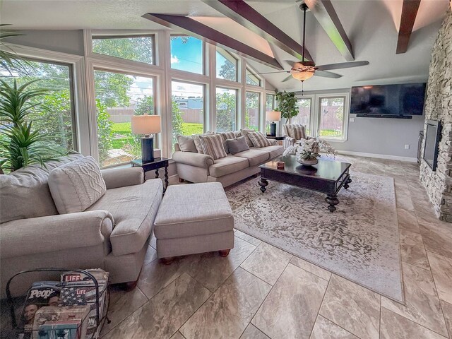 116 Cardinal St, Lake Jackson, TX 77566 - living room with a ceiling fan and a fireplace