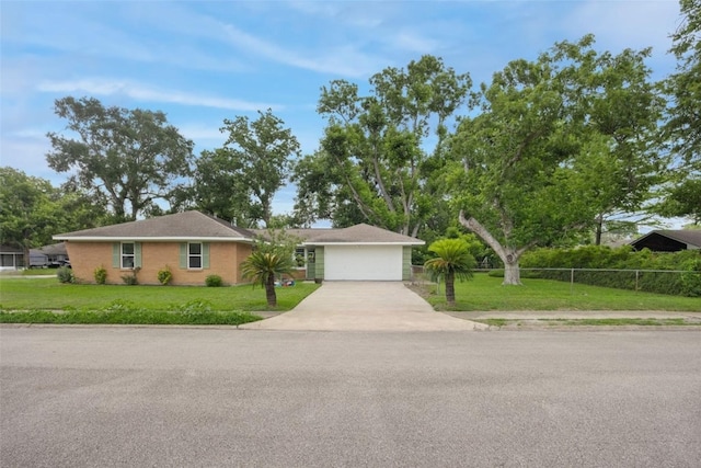 4502 Lido Ln, Houston, TX 77092 - ranch-style home with concrete driveway and an attached garage
