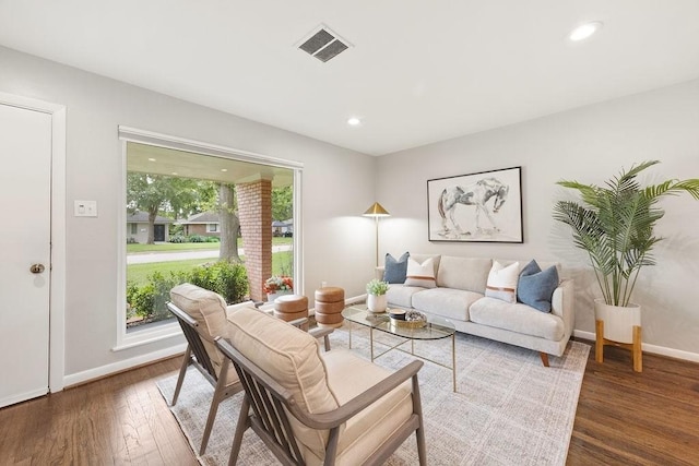 4502 Lido Ln, Houston, TX 77092 - living room featuring wood finished floors and recessed lighting