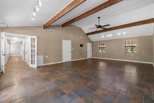 2540 Howell Rd, Corrigan, TX 75939 - unfurnished living room featuring a ceiling fan, french doors, and stone tile floors