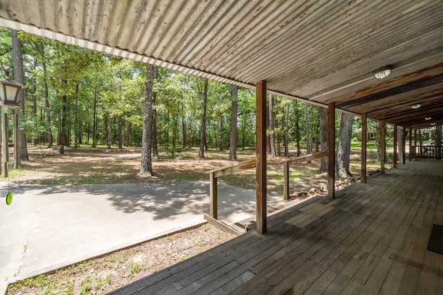 2540 Howell Rd, Corrigan, TX 75939 - wooden terrace with a patio and a forest view