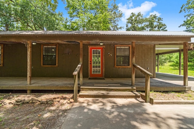 2540 Howell Rd, Corrigan, TX 75939 - property entrance with a metal roof