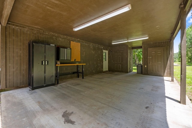 2540 Howell Rd, Corrigan, TX 75939 - garage featuring wood walls
