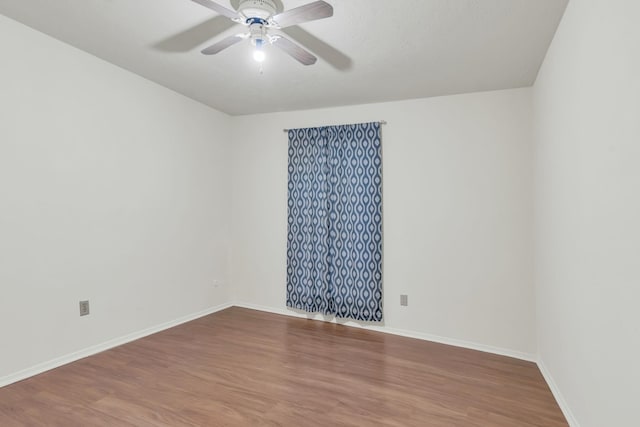 9403 Pinole Ln, Houston, TX 77086 - spare room with a ceiling fan and wood finished floors
