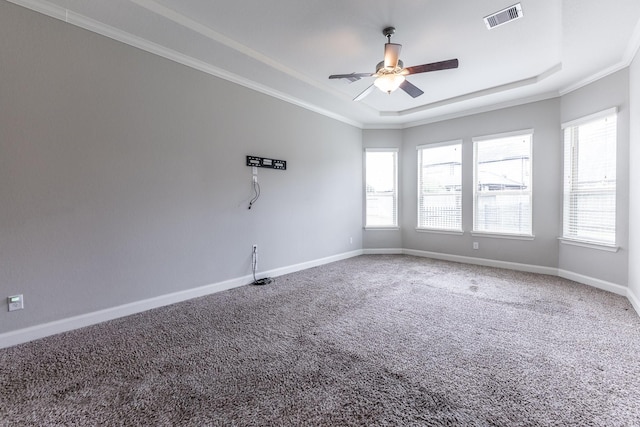 10318 Easterly Ln, Cypress, TX 77433 - carpeted spare room featuring a tray ceiling, a ceiling fan, and crown molding