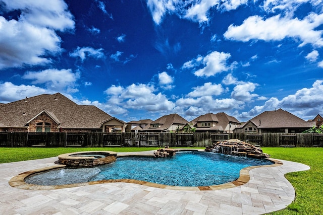 10318 Easterly Ln, Cypress, TX 77433 - view of swimming pool featuring a residential view, a pool with connected hot tub, and a fenced backyard