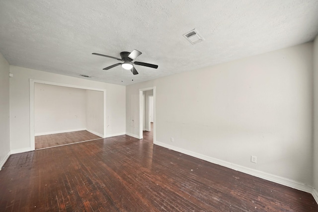 606 W 7th St, Freeport, TX 77541 - spare room with hardwood / wood-style flooring, ceiling fan, and a textured ceiling