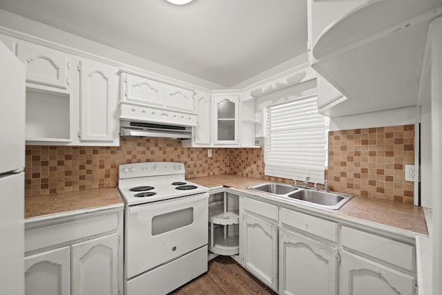 606 W 7th St, Freeport, TX 77541 - kitchen featuring white appliances, ventilation hood, open shelves, white cabinets, and backsplash