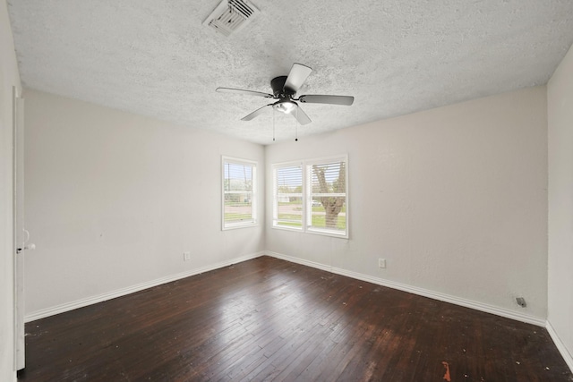 606 W 7th St, Freeport, TX 77541 - spare room featuring hardwood / wood-style floors, a ceiling fan, and a textured ceiling