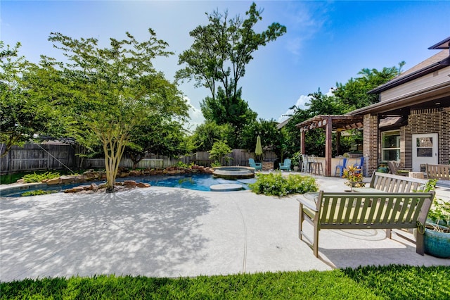 7003 Fall Creek Ln, Missouri City, TX 77459 - view of swimming pool with a patio area, a fenced backyard, a pool with connected hot tub, and a pergola