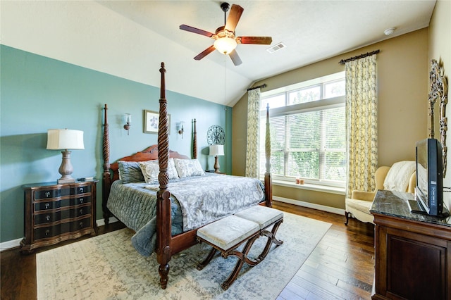 7003 Fall Creek Ln, Missouri City, TX 77459 - bedroom with lofted ceiling, wood finished floors, and a ceiling fan