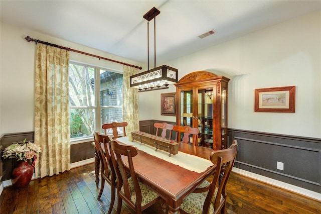 7003 Fall Creek Ln, Missouri City, TX 77459 - dining room with hardwood / wood-style flooring and a wainscoted wall