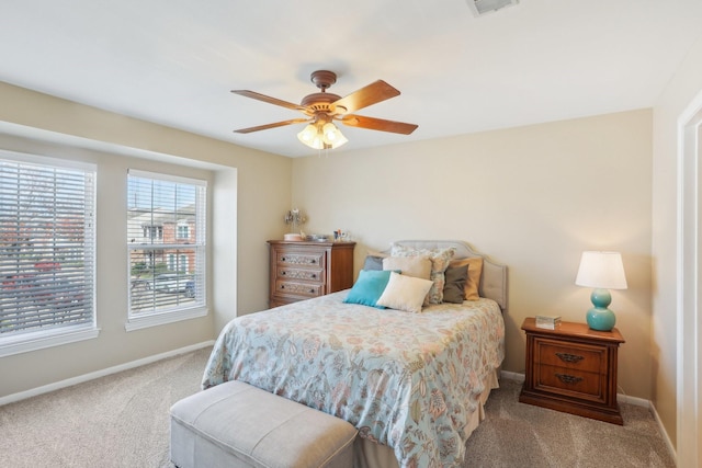 6355 Del Monte Dr Unit 64, Houston, TX 77057 - carpeted bedroom with baseboards and a ceiling fan