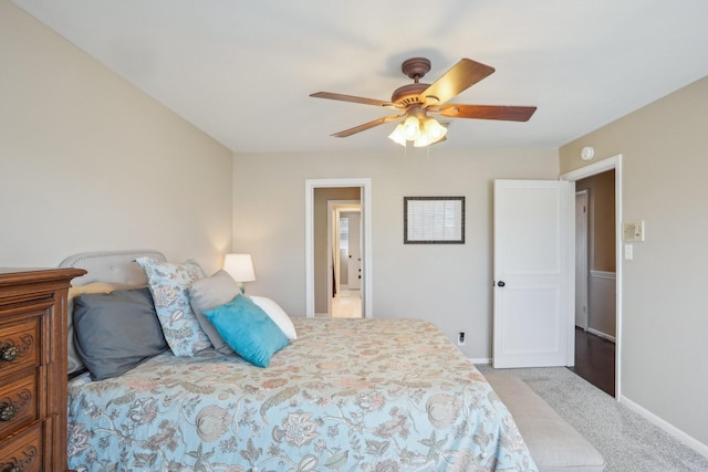 6355 Del Monte Dr Unit 64, Houston, TX 77057 - bedroom with carpet and a ceiling fan