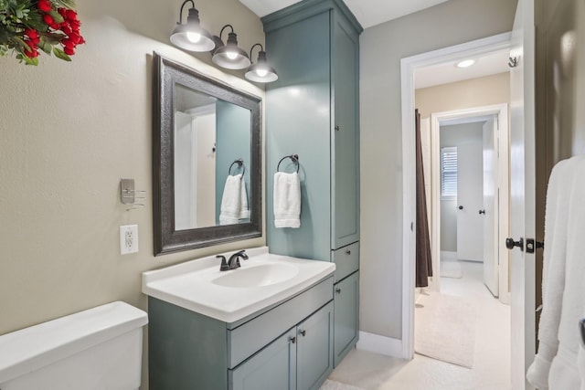 6355 Del Monte Dr Unit 64, Houston, TX 77057 - bathroom featuring toilet and vanity