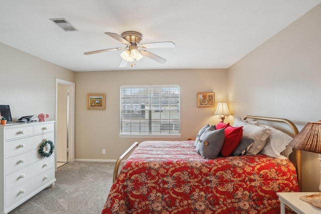 6355 Del Monte Dr Unit 64, Houston, TX 77057 - bedroom with light carpet and a ceiling fan