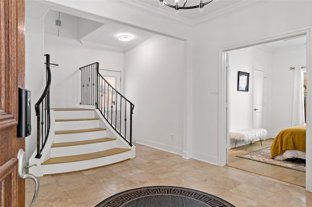 5223 Eigel St, Houston, TX 77007 - foyer with crown molding, stairs, and a chandelier