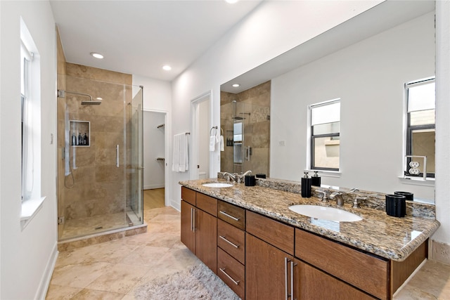 5223 Eigel St, Houston, TX 77007 - full bathroom featuring a shower stall, double vanity, recessed lighting, and tile patterned flooring