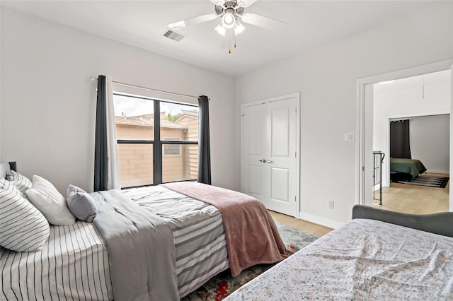 5223 Eigel St, Houston, TX 77007 - bedroom with wood finished floors and a ceiling fan