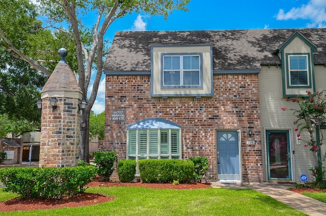 14707 Barryknoll Ln Unit 168, Houston, TX 77079 - view of front of house with a front lawn and brick siding