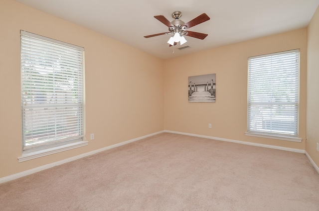 14707 Barryknoll Ln Unit 168, Houston, TX 77079 - spare room featuring carpet flooring and ceiling fan