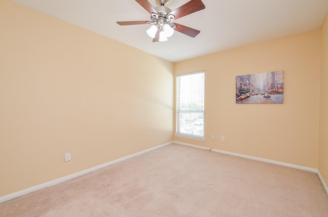 14707 Barryknoll Ln Unit 168, Houston, TX 77079 - empty room featuring light carpet and ceiling fan
