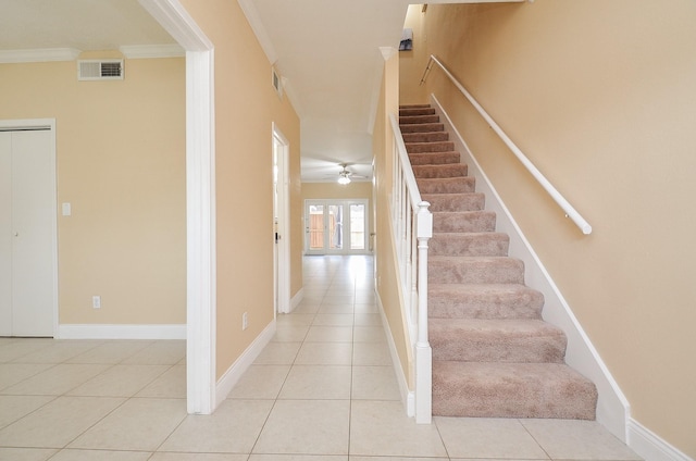 14707 Barryknoll Ln Unit 168, Houston, TX 77079 - stairway featuring tile patterned flooring, ornamental molding, and a ceiling fan