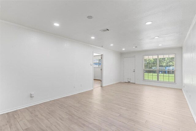 10906 Keese Dr, Houston, TX 77089 - spare room featuring recessed lighting, light wood finished floors, and crown molding