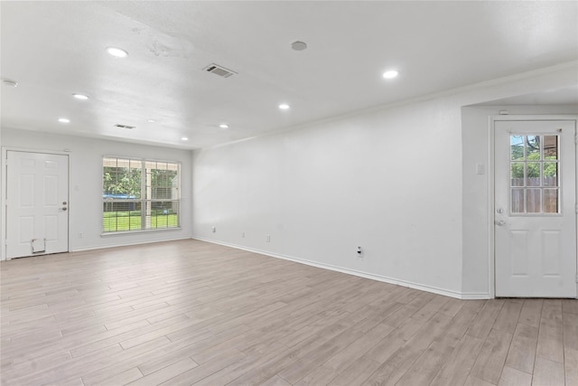 10906 Keese Dr, Houston, TX 77089 - unfurnished living room featuring light wood-type flooring and recessed lighting