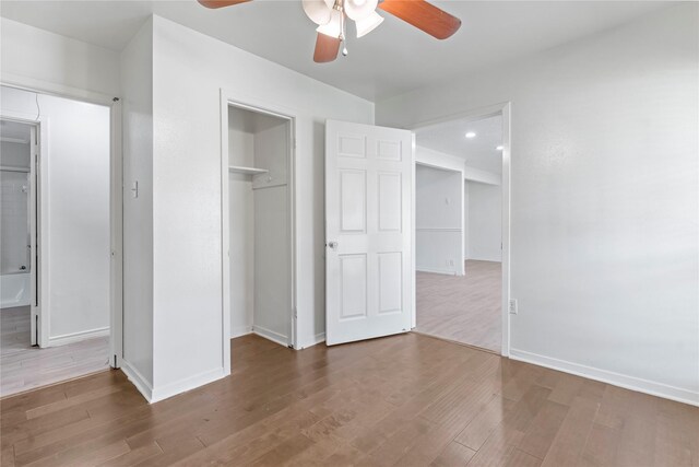 10906 Keese Dr, Houston, TX 77089 - unfurnished bedroom featuring wood finished floors, a closet, and ceiling fan