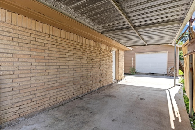 10906 Keese Dr, Houston, TX 77089 - view of patio / terrace with a garage and concrete driveway