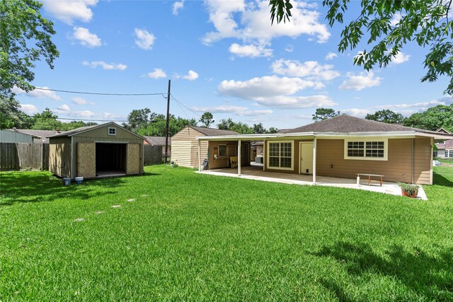 10906 Keese Dr, Houston, TX 77089 - rear view of property with a shed and a patio area