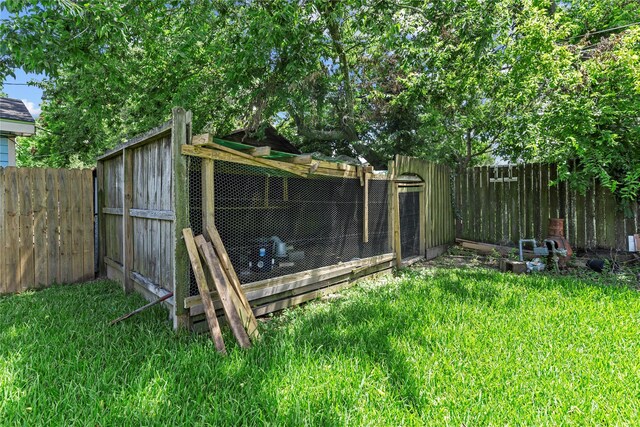 10906 Keese Dr, Houston, TX 77089 - fenced backyard with exterior structure