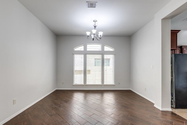 16223 Cotton Grove Ln, Houston, TX 77044 - empty room featuring a chandelier and dark wood finished floors